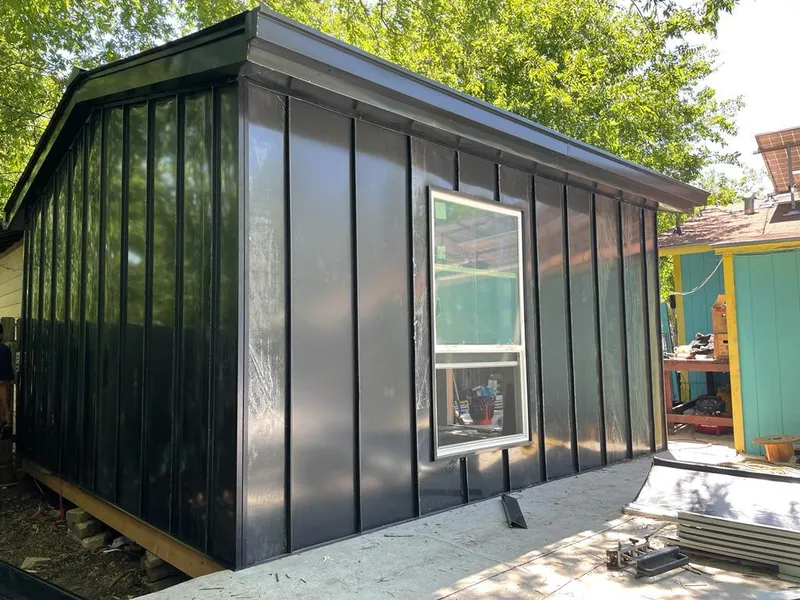 Black standing seam metal wall panels for Metal Roof Installation in Silverton